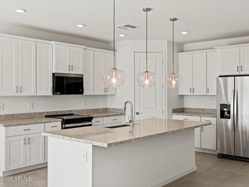 Photo is not of the actual home. Interior finishes and fixtures may vary.
