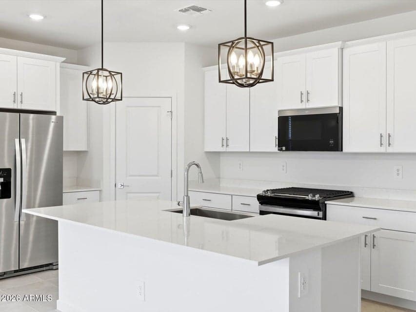 Photo is not of the actual home. Interior finishes and fixtures may vary.