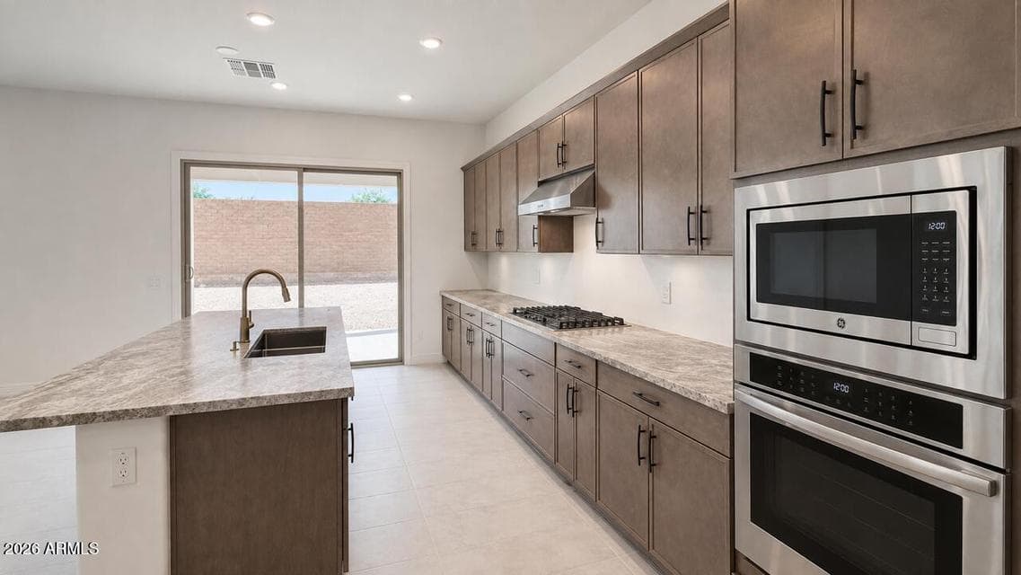 Photo includes virtual staging and landscaping