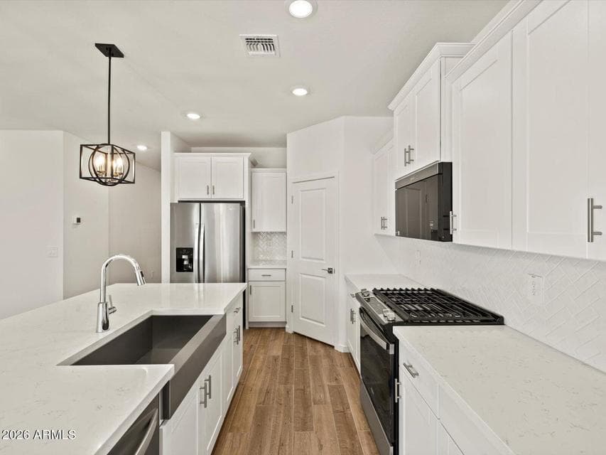Photo is not of the actual home. Interior finishes and fixtures may vary.