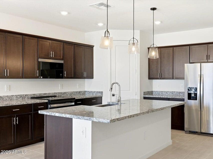 Photo is not of the actual home. Interior finishes and fixtures may vary.