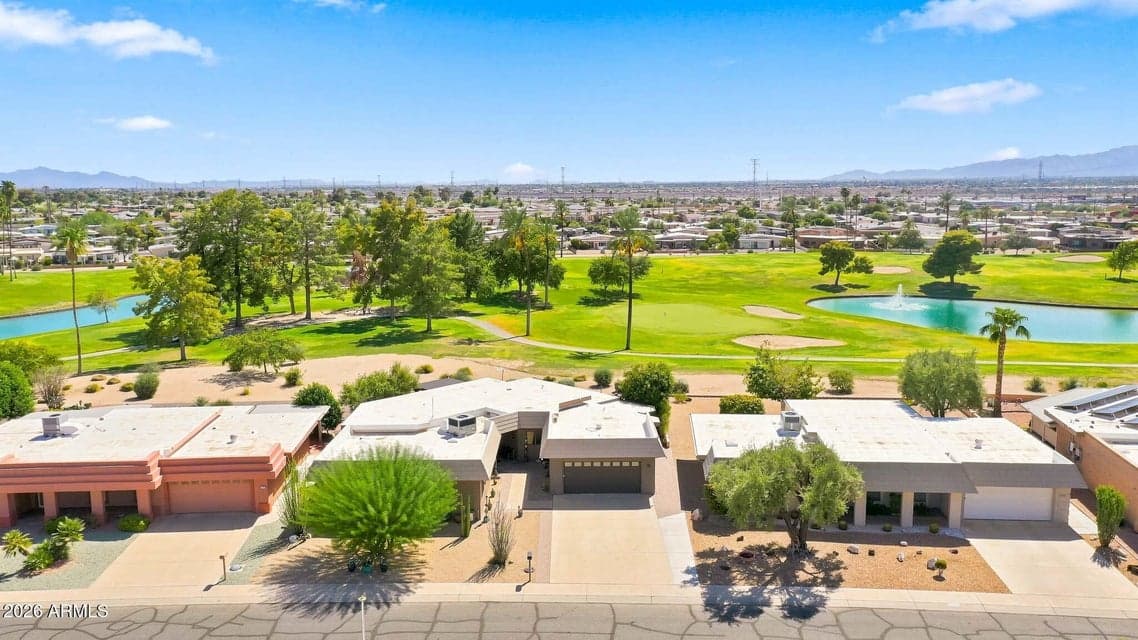 Two Water Views with fountains. Well maintained home with newer 16 seer A/C, Water heater, H2O Water filter, and whole house sediment filter. Paver patio, exterior paint and rain gutters on a double fairway.