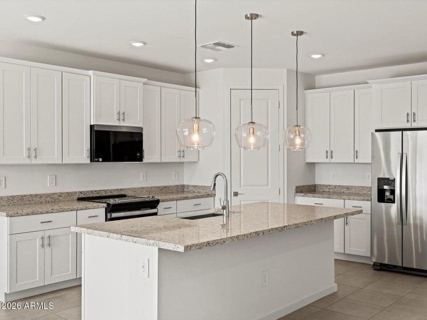 Photo is not of the actual home. Interior finishes and fixtures may vary.