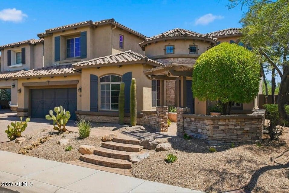 Custom front entrance with welcoming pergola