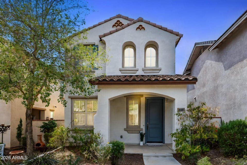 Charming curb appeal welcomes you in with a cozy front porch.