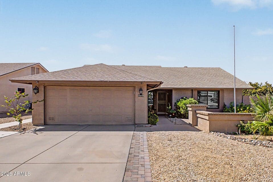 Great Curb Appeal in this 2 Bedroom, 2 Bath Home with 2 Car Garage on Cul-de-Sac!