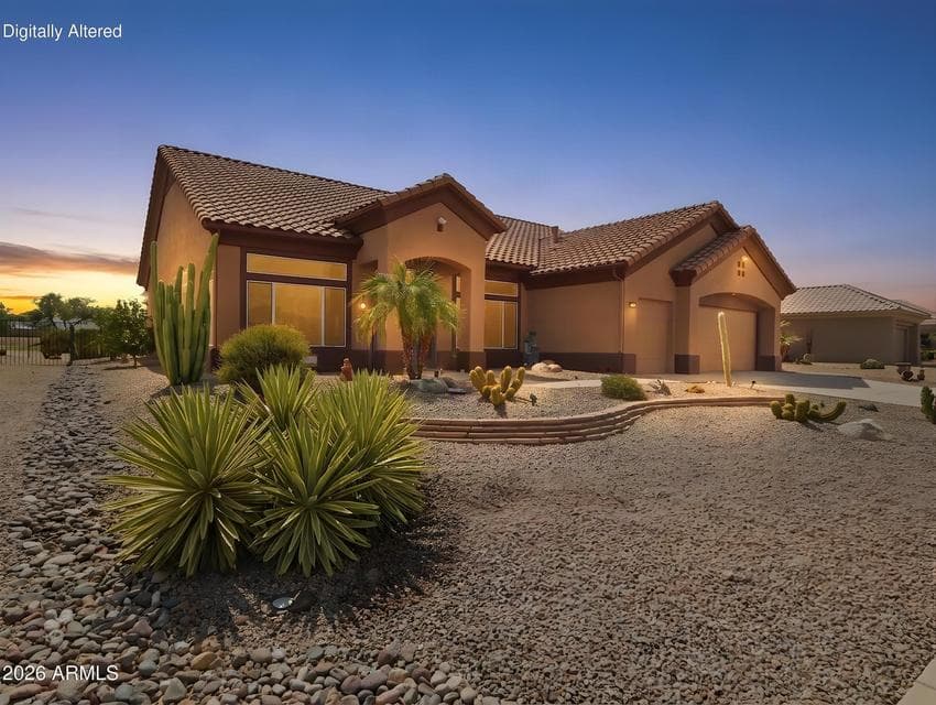 The front of the home with a 2.5 car garage