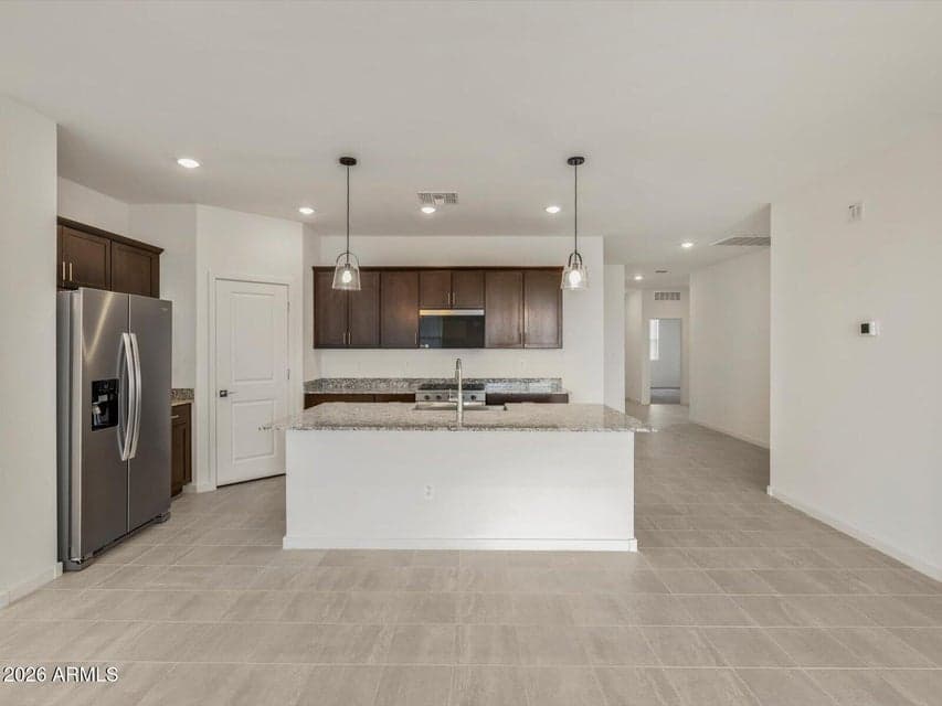 Photo is not of the actual home. Interior finishes and fixtures may vary.
