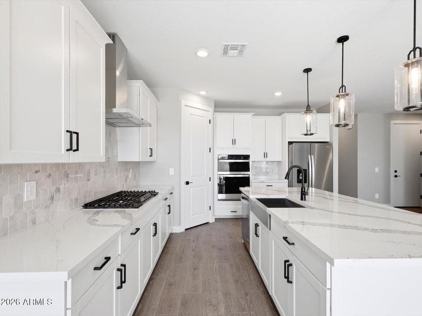 Photo is not of the actual home. Interior finishes and fixtures may vary.