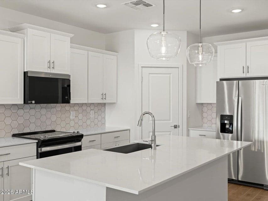 Photo is not of the actual home. Interior finishes and fixtures may vary.
