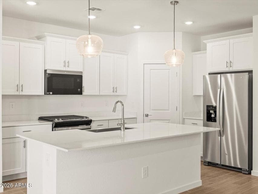Photo is not of the actual home. Interior finishes and fixtures may vary.
