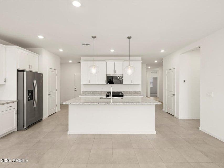 Photo is not of the actual home. Interior finishes and fixtures may vary.
