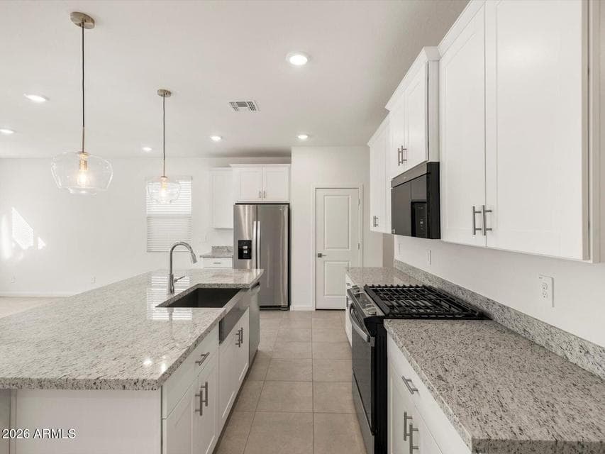 Photo is not of the actual home. Interior finishes and fixtures may vary.