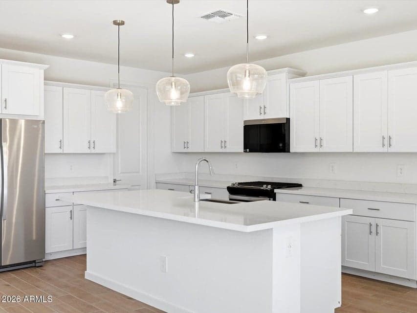 Photo is not of the actual home. Interior finishes and fixtures may vary.