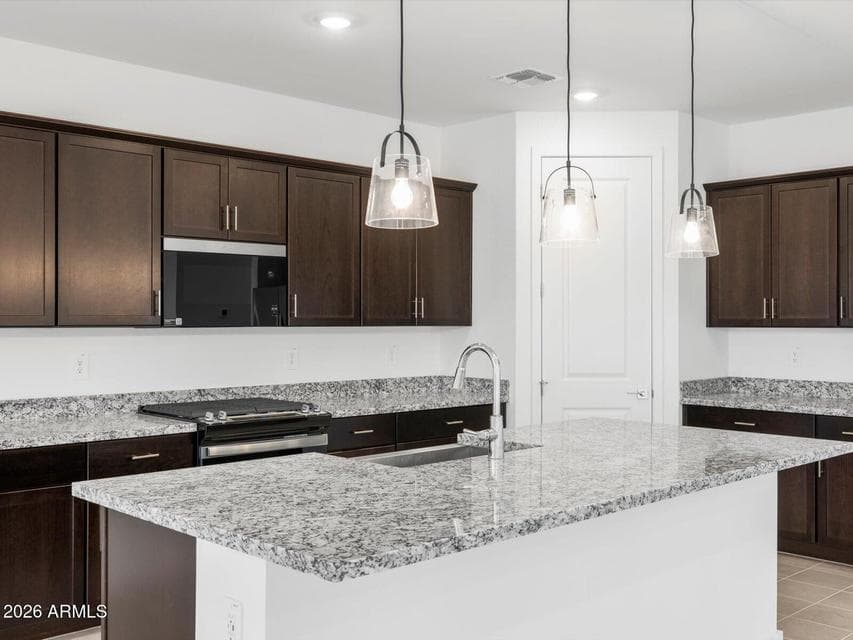 Photo is not of the actual home. Interior finishes and fixtures may vary.