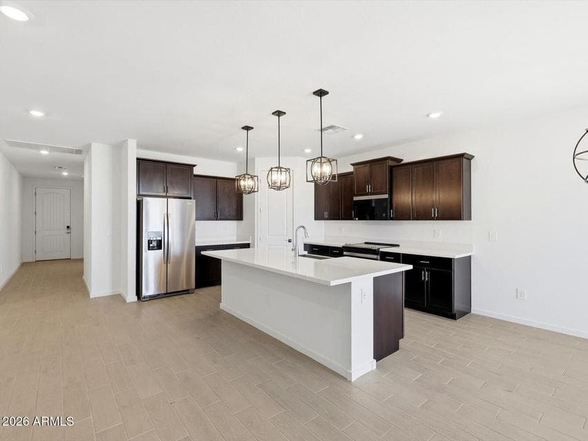 Photo is not of the actual home. Interior finishes and fixtures may vary.