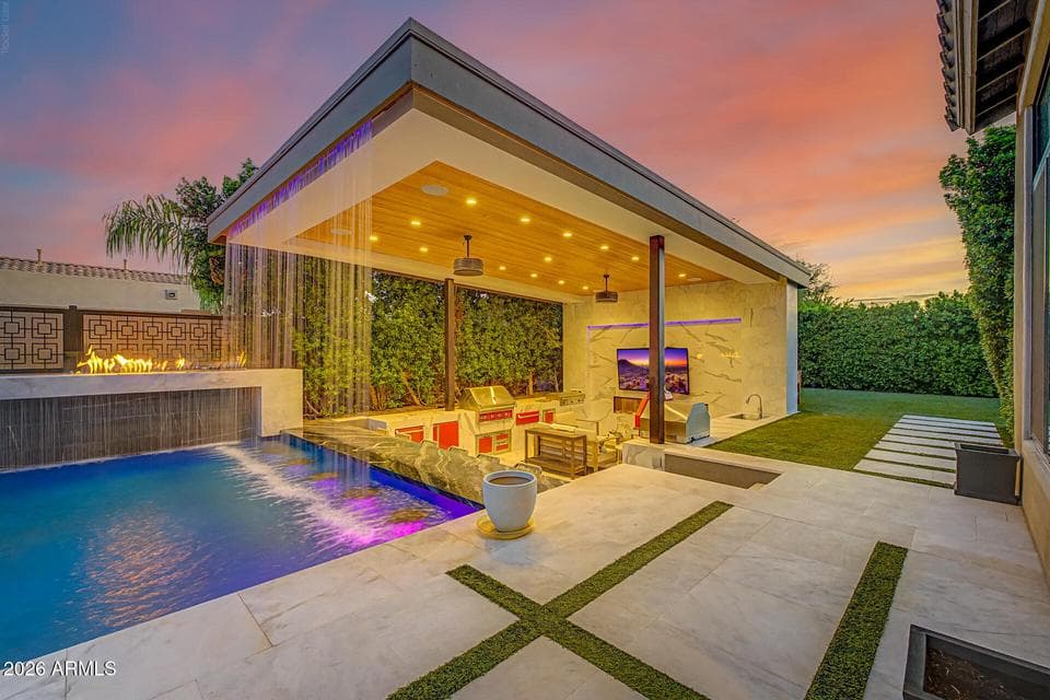 Pool and Covered Outdoor Living at Twilight