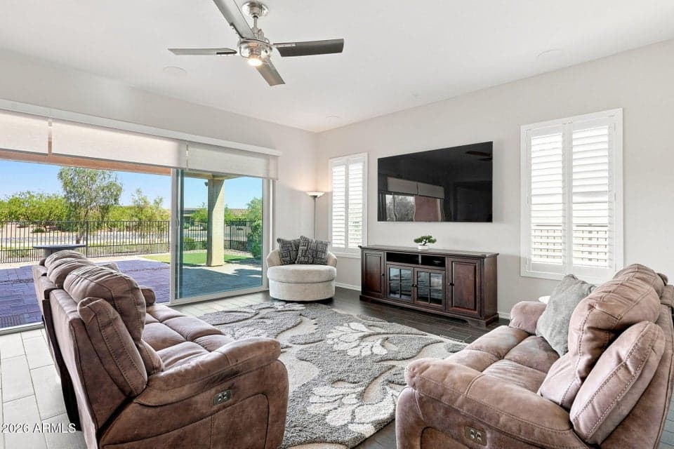 Open Concept view of outside desert wash, living room - patio
