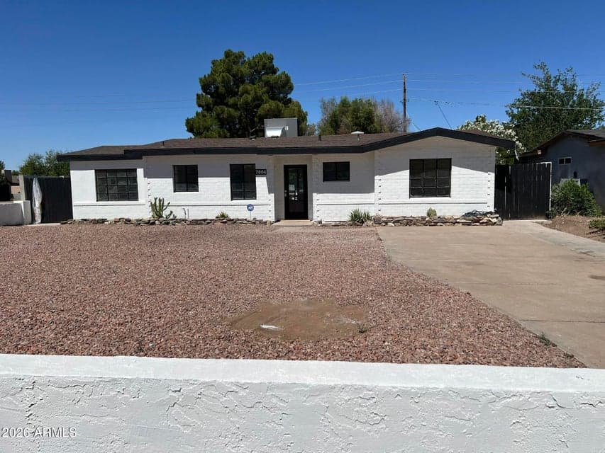 Front Exterior / Contemporary Improvements