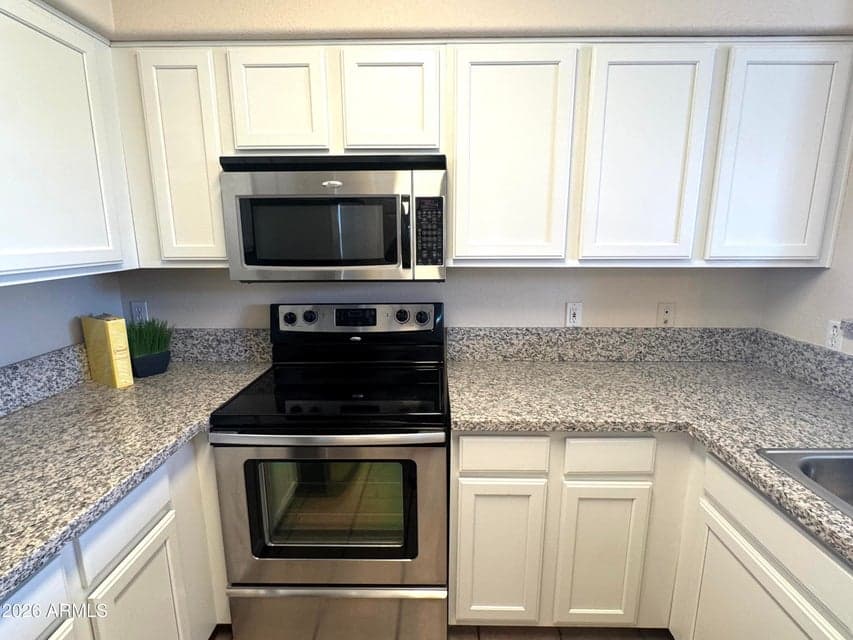Freshly painted cabinetry and new granite counters!