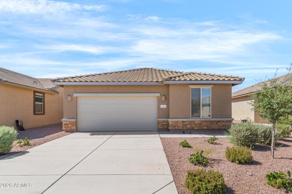 Front yard landscaping and stone veneer