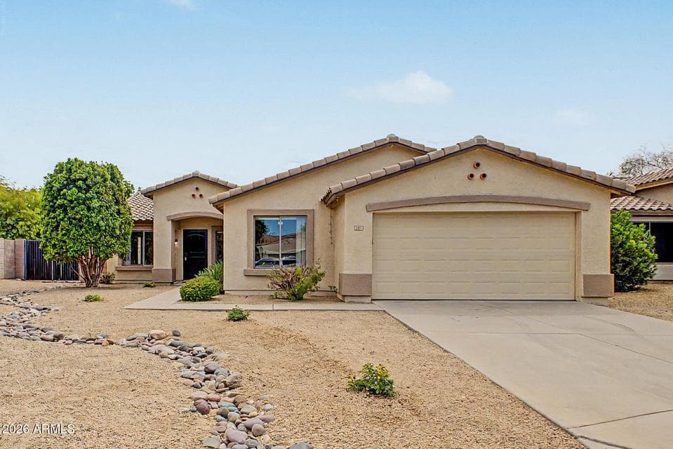 Front Exterior with extended driveway, lot size 9190