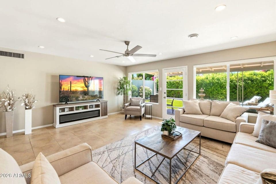 Large scale neutral tile and in-ceiling lighting