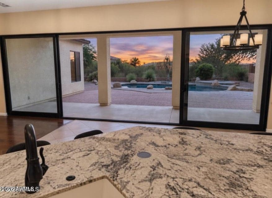 Panaramic doors twilight different angle. Indoor outdoor living