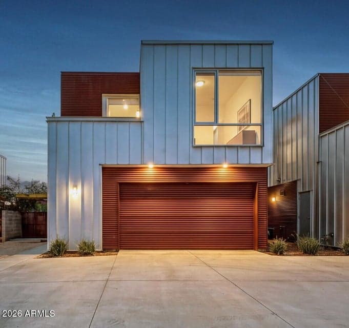 Oversized 2-car Garage & separate Parking Pad