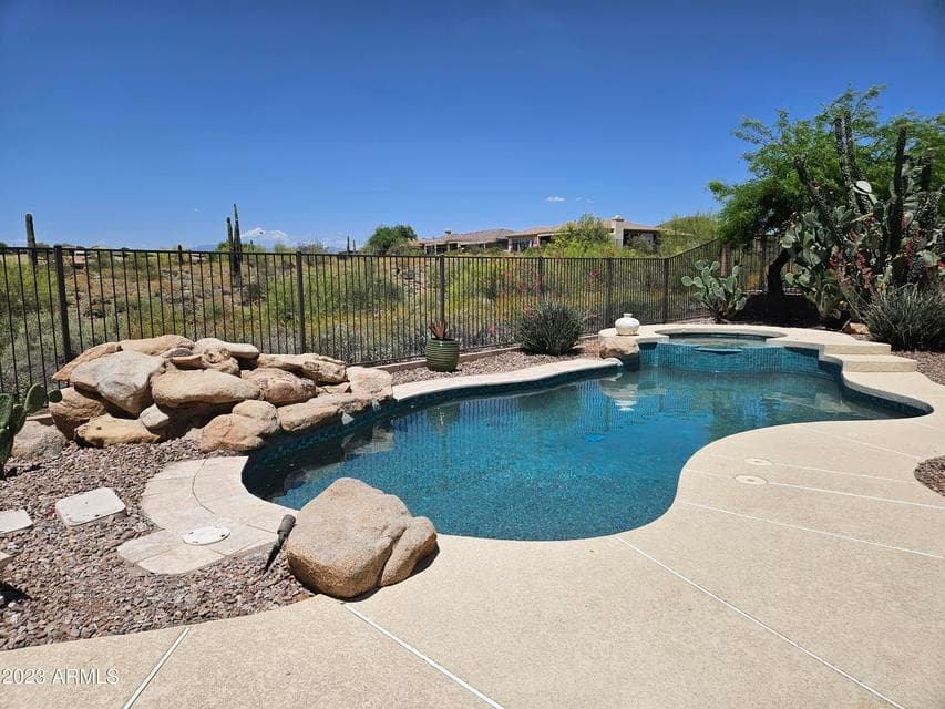 Heated Pool with Waterfall and In-Ground Heated Spa!