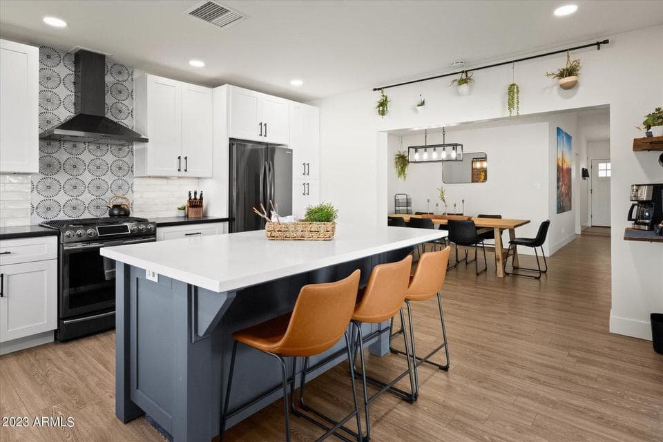 Gather in the large kitchen and overflow into the dining area