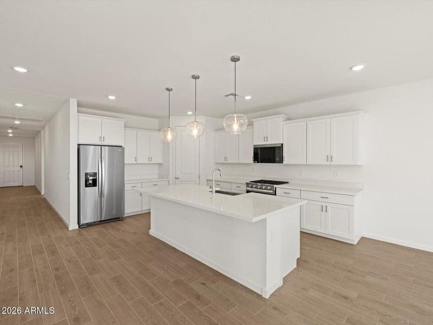 Photo is not of the actual home. Interior finishes and fixtures may vary