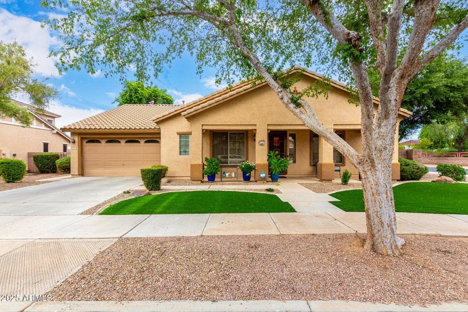 artificial turf, 4 car garage, corner lot