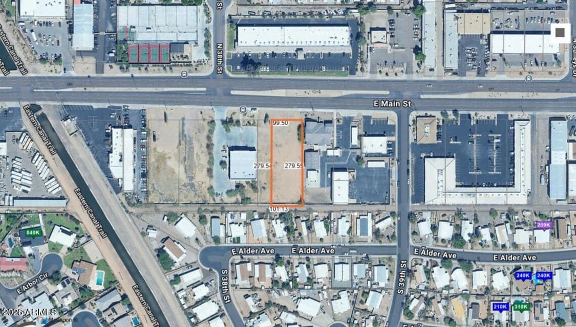 Lot between O'Reilly's and pictured lot included with sale