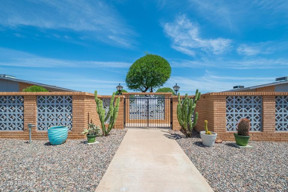 10654 W COGGINS Drive, Sun City, AZ 85351 — photo 1 of 18