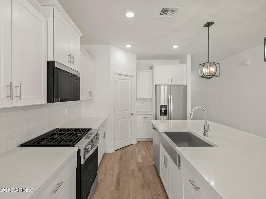 Photo is not of the actual home. Interior finishes and fixtures may vary.