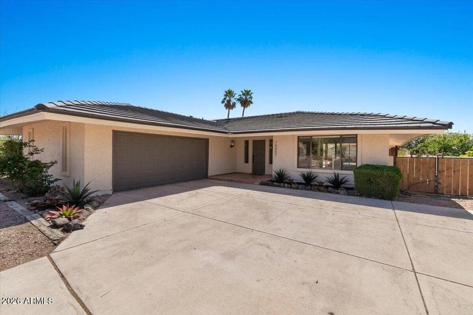 Extended 2 car garage & double gate.