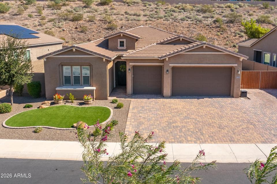 Gorgeous single-level home with 3 bedrooms, plus a den, flowing floorplan, multi-slide door to the backyard, 3-car garage, pavers, and RV Gate.