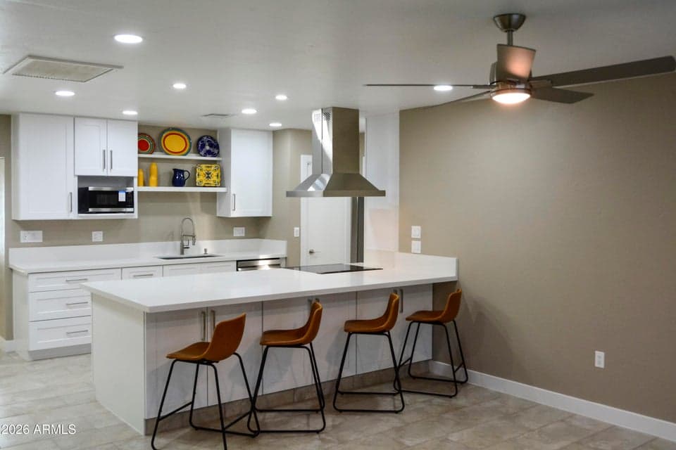 The biggest "WOW" factor in this fully remodeled "Doll House" is the open kitchen! The 9.5 foot island opens up to the Great Room!