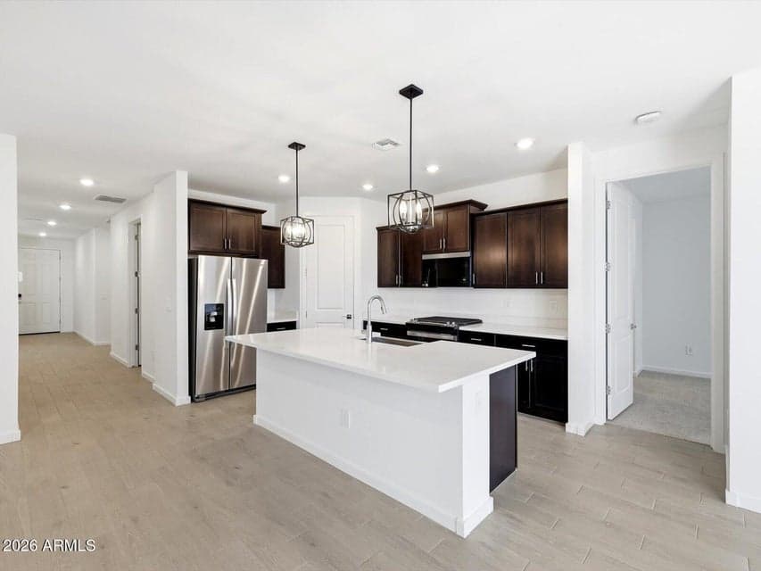 Photo is not of the actual home. Interior finishes and fixtures may vary.