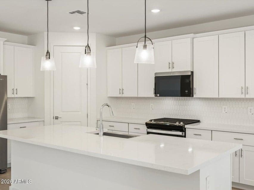 Photo is not of the actual home. Interior finishes and fixtures may vary.
