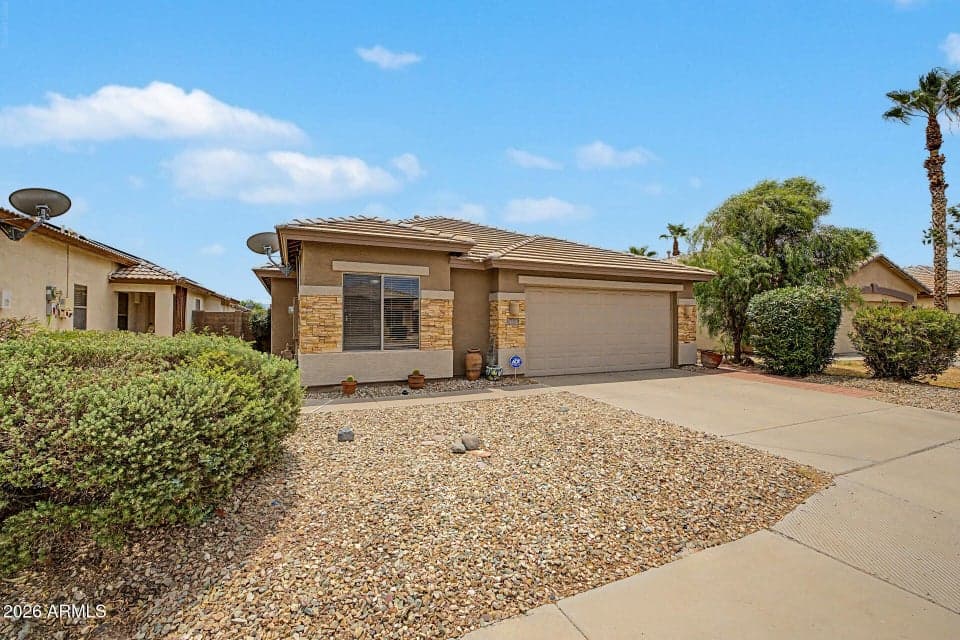 No "plain stucco front" on this home!