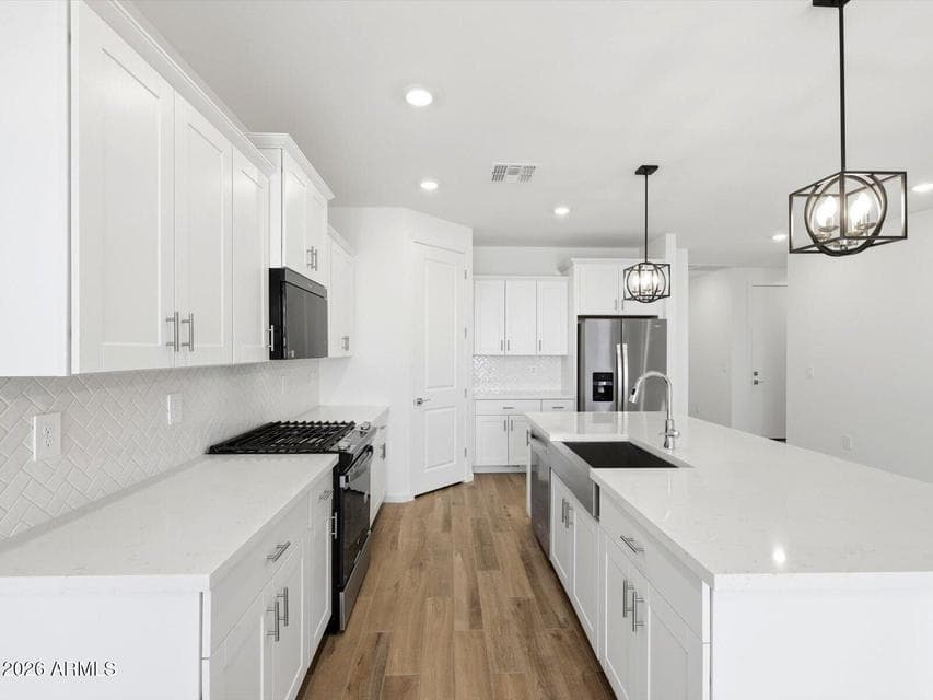 Photo is not of the actual home. Interior finishes and fixtures may vary.