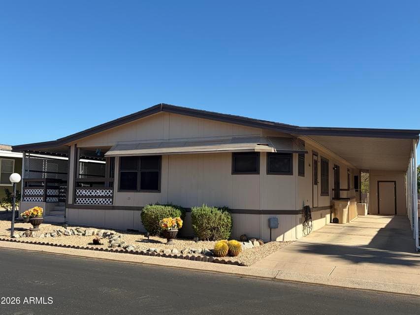 Spacious doublewide home with 2 car tandem carport