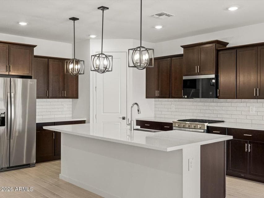 Photo is not of the actual home. Interior finishes and fixtures may vary.