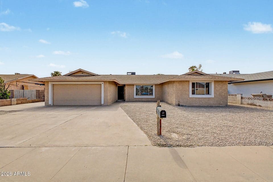 Driveway parking holds 3-4 vehicles and don't forget large, usable RV gate to the left.
