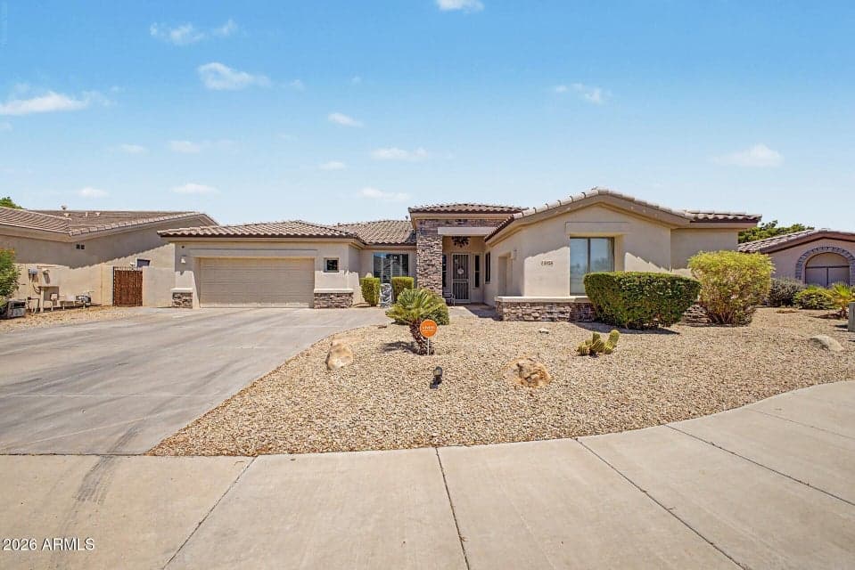 Front of Home, with Stone Veneer.