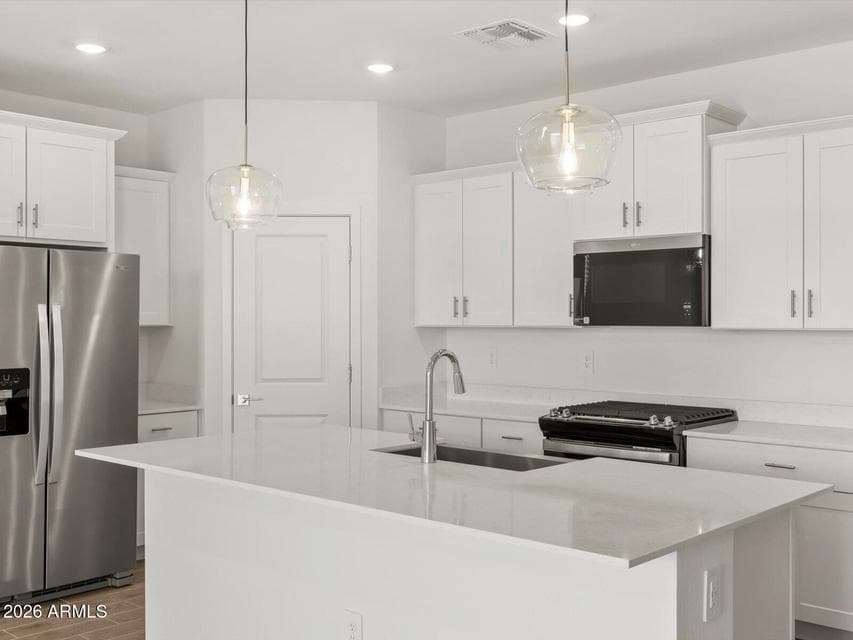 Photo is not of the actual home. Interior finishes and fixtures may vary.
