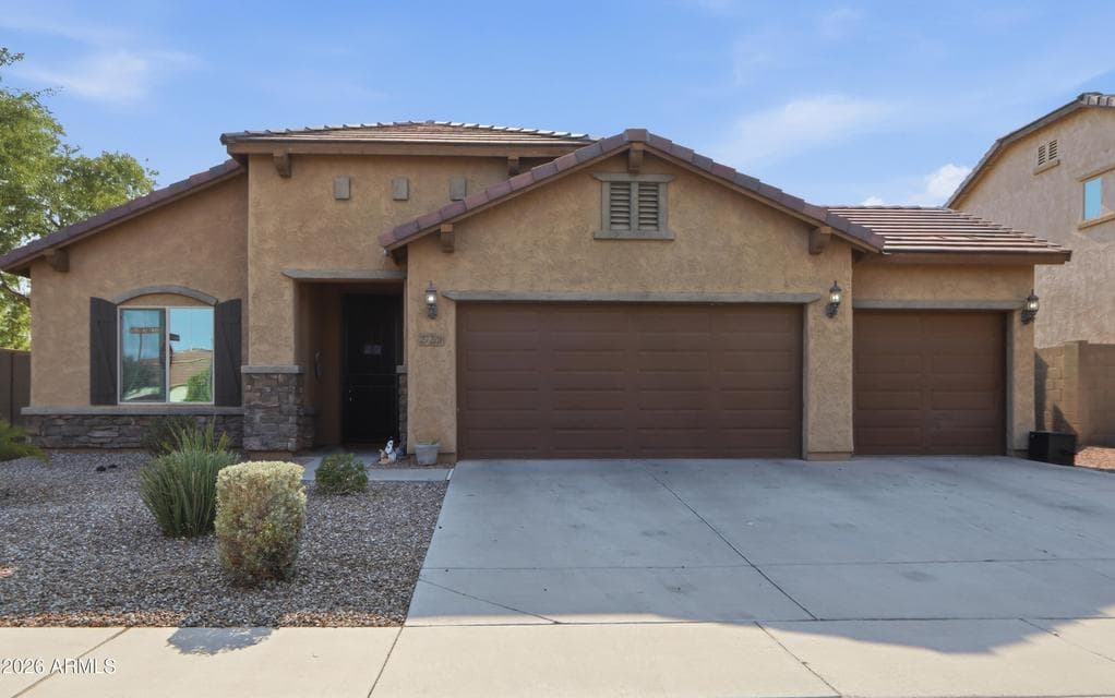 Welcome home! And look at all that garage space.