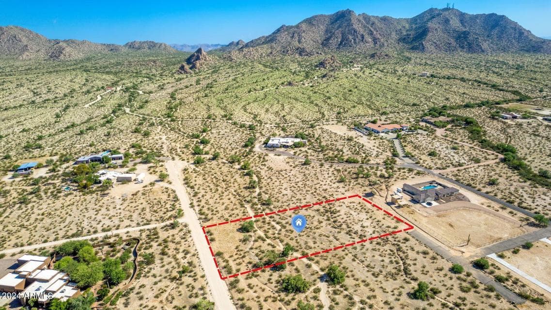 Enjoy desert living on this 2-acre parcel in the north foothills of Casa Grande with views of Sacaton Peak and the beautiful twinkle of city lights.*lot lines are an estimate only